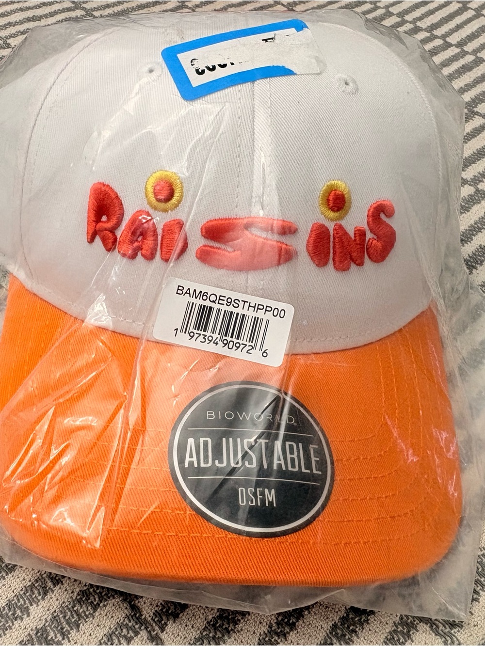 Bioworld White and Bright Orange Embroidered 'Raisin' Baseball Cap